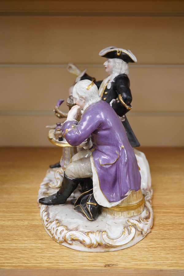 A 19th century Meissen group of The Dentist, outside decorated, incised model no. 186, 21cm. Condition - broken and restored